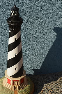 diagonal, black, white, sunlight, no people, built structure, architecture, nature, guidance, building exterior, shadow, lighthouse, tower, day, security, outdoors, high angle view, protection, safety, wall - building feature, building, wall, sea, 5K, CC0, public domain, royalty free