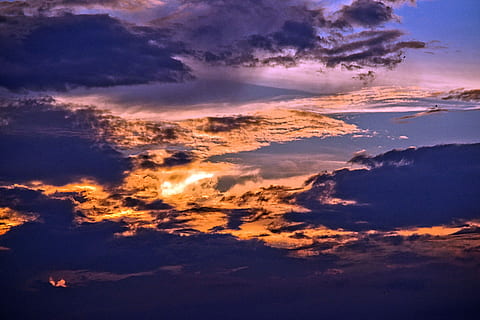 fiery sunset, golden, hour photography, clouds, sunlight, sky, cloud, sunset, dark, blue, fire, sun, cloud - sky, beauty in nature, dramatic sky, environment, scenics - nature, cloudscape, nature, awe, atmosphere, tranquility, no people, tranquil scene, backgrounds, idyllic, heaven, outdoors, meteorology, 5K, CC0, public domain, royalty free
