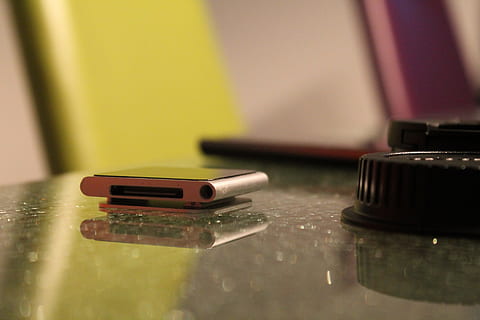 Ipod, Table, Device, Mp3 Player, equipment, technology, music, player, audio, sound, media, electronic, electronics, reflection, no people, indoors, close-up, day, selective focus, arts culture and entertainment, wireless technology, communication, focus on foreground, still life, single object, musical instrument, handgun, social issues, office, portability, 4K, CC0, public domain, royalty free