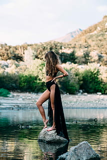 woman, wearing, black, crop, top, standing, gray, stone, body, water, daytime, crop top, body of water, women, lake, nature, outdoors, one Person, summer, people, females, caucasian Ethnicity, river, young Adult, beautiful, relaxation, beauty, adult, beauty In Nature, lifestyles, tranquil Scene, reflection, long hair, real people, hairstyle, day, hair, leisure activity, focus on foreground, waterfront, rear view, looking at view, 5K, CC0, public domain, royalty free