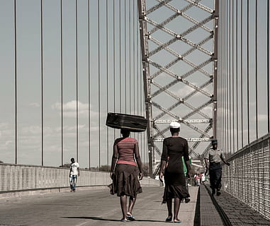 bridge, engineering, co, bridge construction, transportation, construction, architecture, steel, metal, outdoor, zimbabwe, africa, real people, built structure, group of people, bridge - man made structure, rear view, men, walking, people, sky, building exterior, city, day, lifestyles, full length, travel, leisure activity, women, outdoors, 2K, CC0, public domain, royalty free