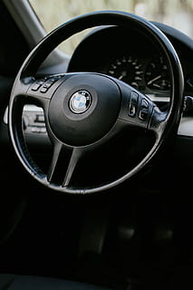 inside a car, car, interior, black, bmw, dashboard, driving, transportation, steering Wheel, land Vehicle, speedometer, vehicle Interior, wheel, speed, modern, close-up, black Color, metal, no people, vehicle part, indoors, car interior, mode of transportation, motor vehicle, gearshift, circle, focus on foreground, number, geometric shape, technology, luxury, 2K, CC0, public domain, royalty free