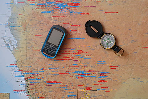 compass, map, navigation, navigation device, indoors, no people, communication, direction, technology, still life, wood - material, text, guidance, high angle view, travel, discovery, close-up, multi colored, time, directly above, exploration, business, 5K, CC0, public domain, royalty free