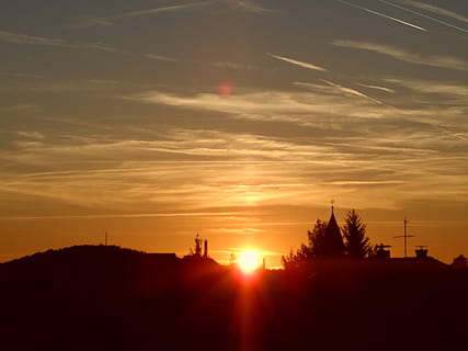Sunset, Sun, Twilight, Nature, sky, reddish, red, burning, evening, afterglow, clouds, spotlight, fiery, silhouette, no people, cloud - sky, travel destinations, orange color, beauty in nature, sunlight, scenics - nature, tranquil scene, tranquility, lens flare, tree, idyllic, outdoors, landscape, built structure, architecture, 4K, CC0, public domain, royalty free