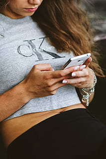 young, woman, holding, white, mobile, phone, caucasian, female, girl, tech, technology, hands, femine, white phone, smartphone, screentouch, text Messaging, mobile Phone, women, people, telephone, adult, one Person, communication, females, smart Phone, lifestyles, wireless Technology, young Adult, caucasian Ethnicity, indoors, midsection, adults only, only women, real people, portable information device, using phone, leisure activity, casual clothing, connection, hairstyle, outdoors, 2K