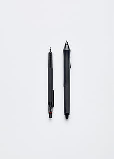 two, black, retractable, pens, white, surface, objects, office, writing, modern, equipment, single Object, white background, studio shot, no people, indoors, copy space, high angle view, still life, group of objects, simplicity, three objects, in a row, pen, weapon, close-up, writing instrument, two objects, directly above, social issues, wood - material, aggression, 1080P, CC0, public domain, royalty free
