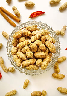 dried salted peanuts, dried, salted, peanuts, nut, nuts, peanut, food, seed, snack, nut - Food, healthy Eating, organic, close-up, almond, fruit, food And Drink, dry, ingredient, vegetarian Food, heap, brown, nature, raisin, granola, breakfast cereal, still life, freshness, high angle view, indoors, wellbeing, no people, large group of objects, white background, table, directly above, bowl, studio shot, sweet food, breakfast, temptation, 2K, CC0, public domain, royalty free