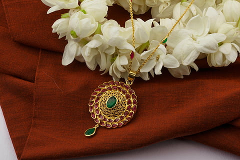 round gold-colored medallion pendant, top, brown, fabric sheet, ruby, emerald, pendant chain, jewellery, gem, gemstone, jewel, flower, flowering plant, plant, jewelry, beauty in nature, indoors, luxury, necklace, no people, close-up, white color, wealth, fashion, still life, rose, rose - flower, elegance, personal accessory, flower head, nature, pearl jewelry, flower arrangement, 5K, CC0, public domain, royalty free