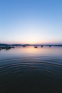 white, boats, body, water, sunset, photo, high, angle, mountain, sky, boat, sailing, sea, ocean, beach, shore, dark, reflection, blue, nature, outdoors, tranquility, dusk, beauty in nature, scenics - nature, waterfront, tranquil scene, no people, idyllic, copy space, clear sky, 5K