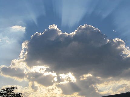 crepuscular on clouds, dark cloud, surrounded with light, light source behind, backlight, bright edging, luminescent patches, light shafts emanating, blue sky, cloud - sky, sky, beauty in nature, tranquility, sunlight, cloudscape, scenics - nature, nature, idyllic, tranquil scene, no people, dramatic sky, low angle view, outdoors, backgrounds, day, sunbeam, heaven, atmosphere, meteorology, wind, bright, 2K, CC0, public domain, royalty free