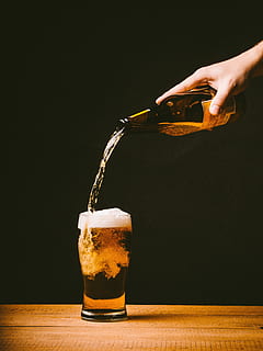 Beer, beers, bottle, drink, drinks, glass, beer - Alcohol, alcohol, lager, pub, liquid, drop, pint Glass, close-up, full, drinking Glass, frothy Drink, brewery, cold - Temperature, yellow, human hand, human body part, food and drink, black background, hand, refreshment, indoors, household equipment, pouring, one person, freshness, holding, table, food, unrecognizable person, real people, finger, 4K