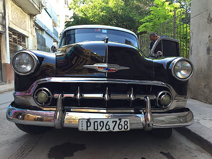 cilvēks, stāv, blakus, 1951, melns, chevrolet, bel, gaiss, betons, sienas, Kuba, auto, oldtimer, havana, transportēšana, vecmodīgs, sauszemes transportlīdzekli, nav cilvēku, dienā, transporta veids, retro stils, mehānisko transportlīdzekli, vintage automašīna, lukturi, stacionārs, iela, antikvariāts, metāla, pilsēta, ārā, pagātne, arhitektūra, tekstu, greznība, hroms, 2K, CC0, publiskais domēns, bez atlīdzības