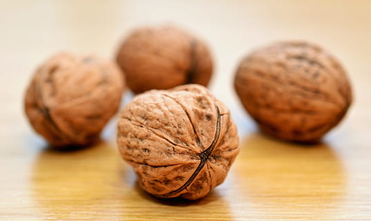 brown nuts photography, walnuts, nuts, healthy, shell, brown, tasty, vitamins, food and drink, food, close-up, wellbeing, healthy eating, group of objects, indoors, freshness, nut, table, nut - food, no people, focus on foreground, wood - material, walnut, still life, fruit, selective focus, nutshell, snack, small group of objects, 4K, CC0, public domain, royalty free
