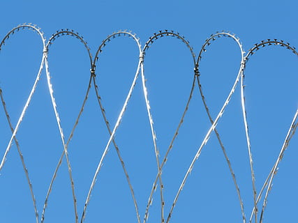 security, wire, risk, fence, blue, barbed Wire, metal, sky, no people, safety, protection, boundary, clear sky, low angle view, barrier, razor wire, nature, communication, connection, day, technology, blue background, 2K, CC0, public domain, royalty free
