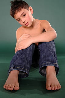 cute, guy, model, young, one person, men, males, indoors, casual clothing, boys, portrait, jeans, child, front view, sitting, green color, looking at camera, childhood, green background, leisure activity, shirtless, studio shot, adolescence, teenage boys, contemplation, shorts, teenager, 2K, CC0, public domain, royalty free