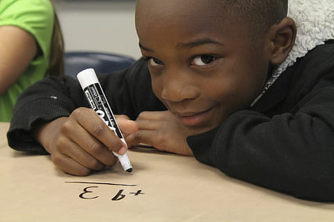 boy, wearing, black, parka coat, writing, marker, sweater, math, student, desk, elementary, school, child, education, classroom, knowledge, learn, children learning, childhood, two people, holding, headshot, casual clothing, boys, males, men, indoors, offspring, girls, portrait, communication, people, text, paper, calligraphy, teenager, 2K, CC0, public domain, royalty free